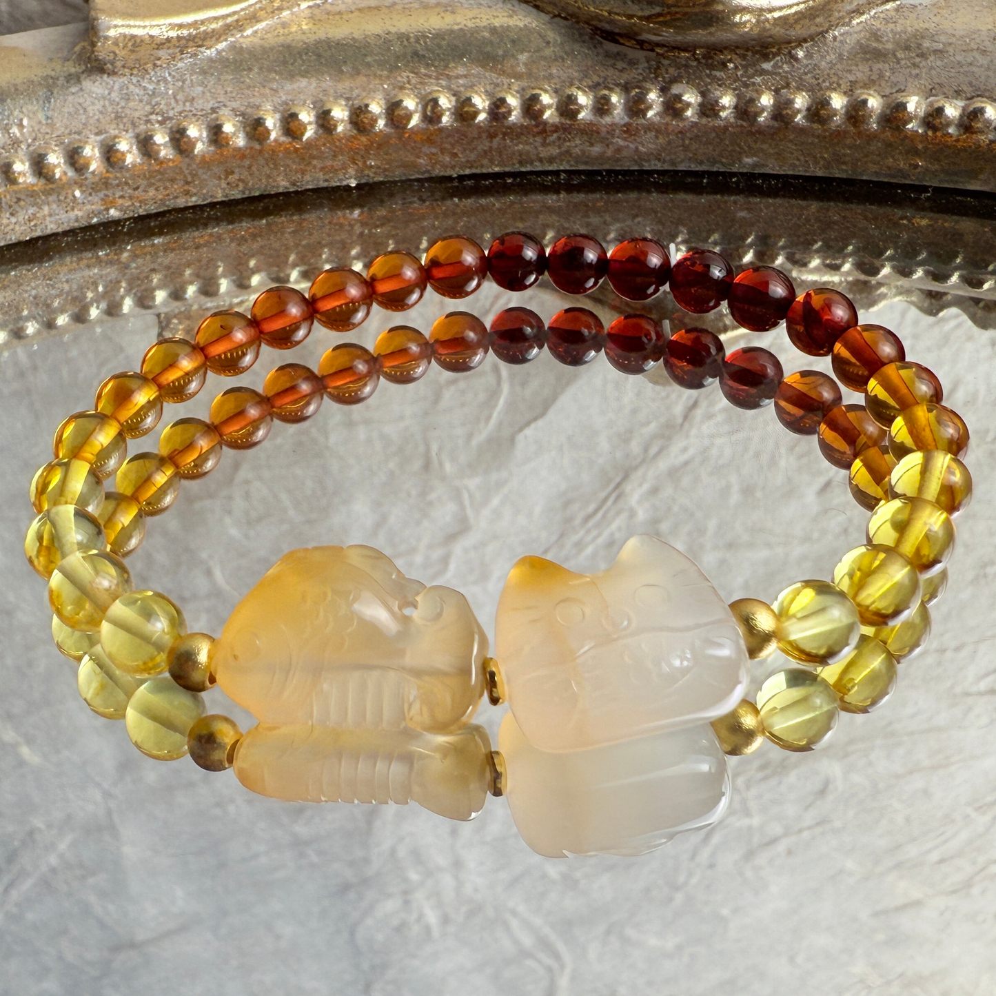 Kitty, fish biscuit + Amber bracelet
