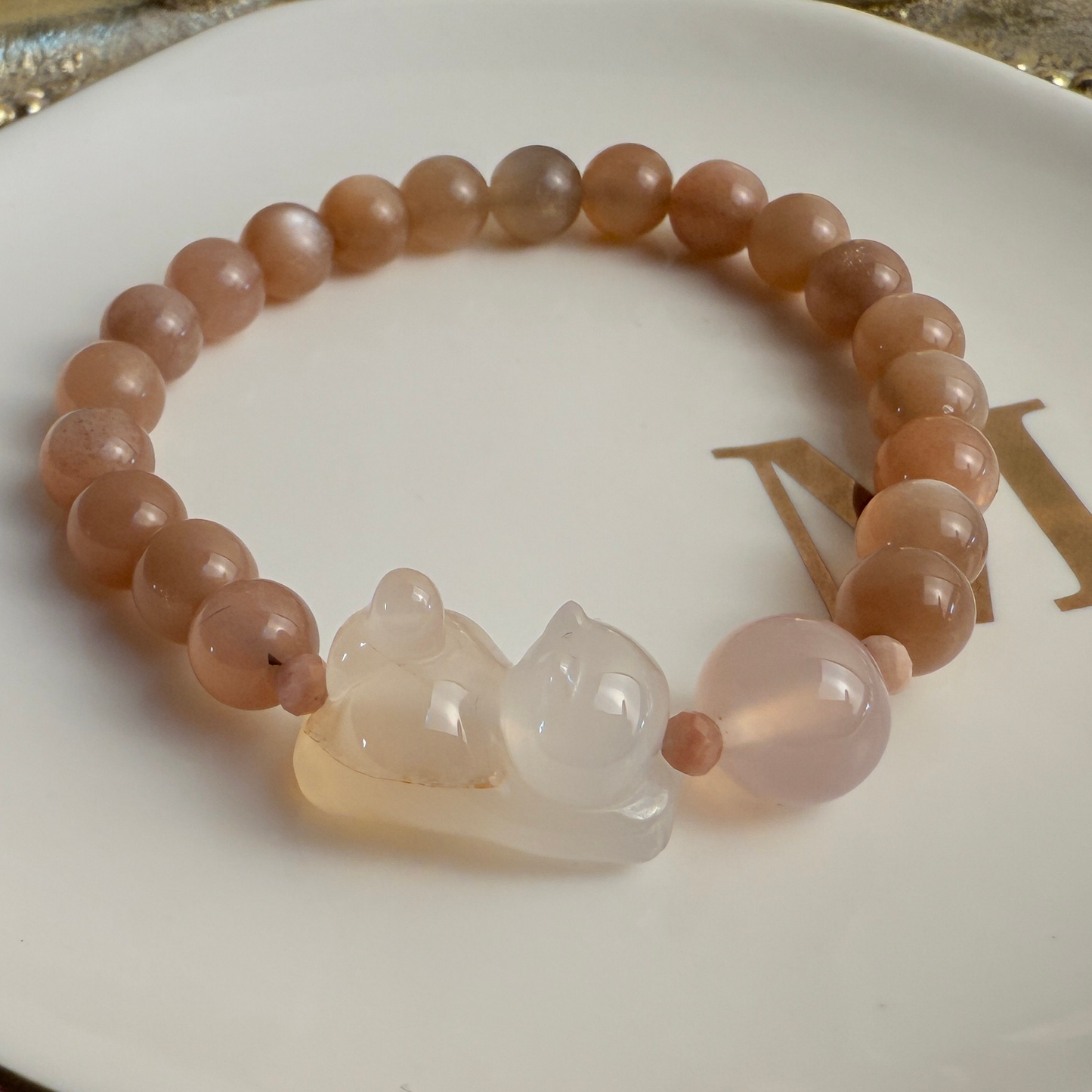 Playing Kitty: Orange moonstone, paw print bead bracelet