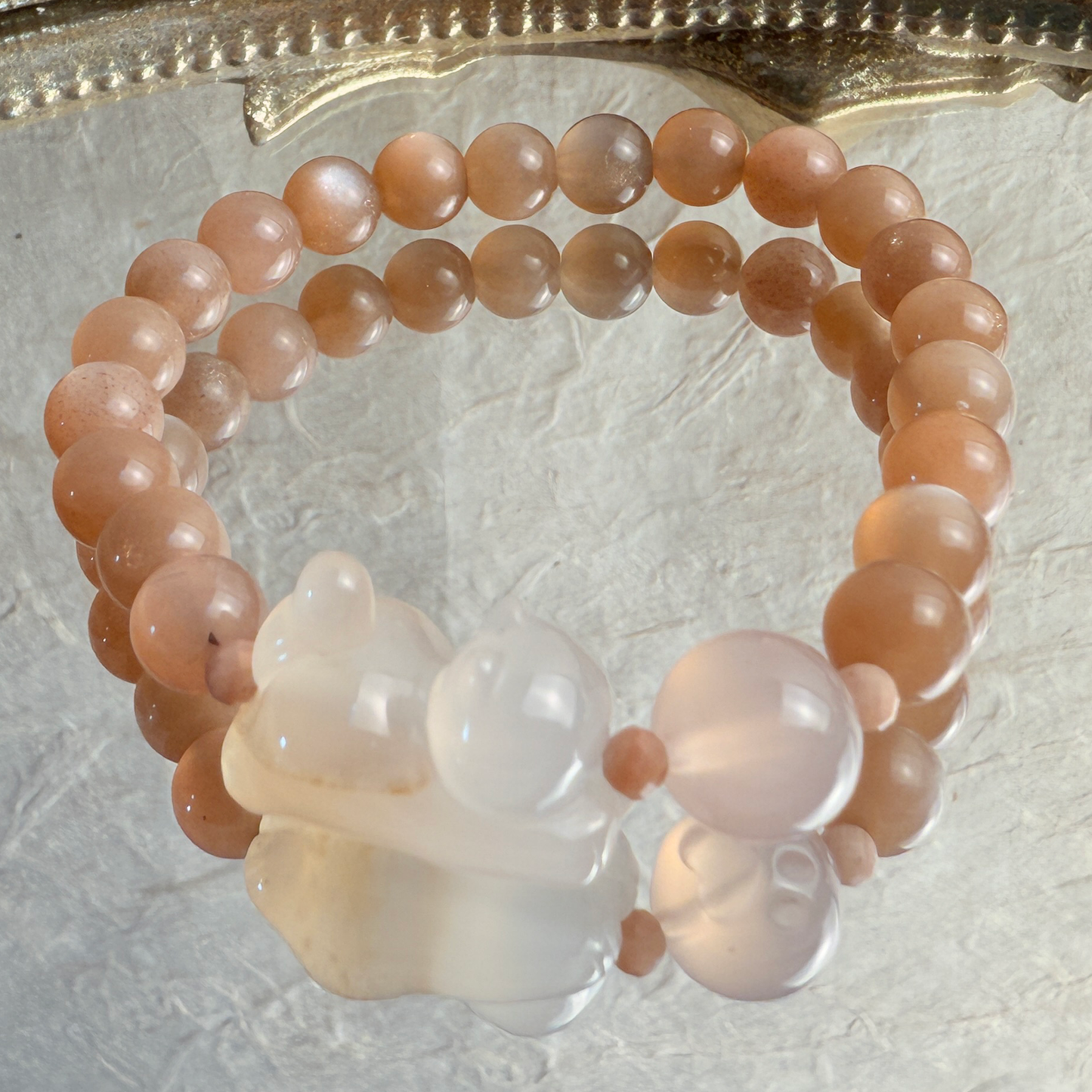 Playing Kitty: Orange moonstone, paw print bead bracelet