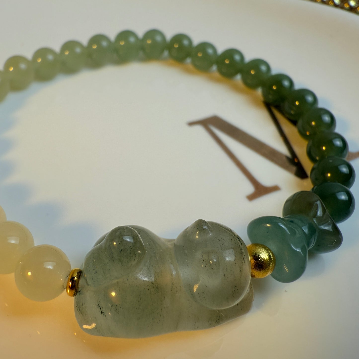 Playing Kitty: Bow charm, Jade bracelet II